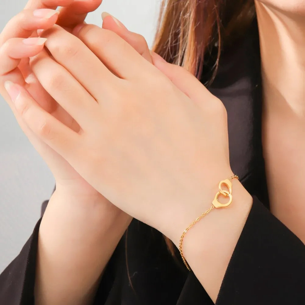 Handcuff Bracelets on Hand