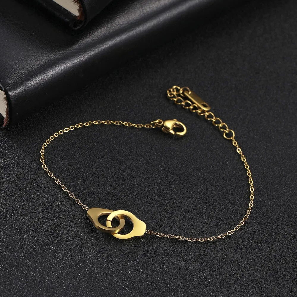Handcuff Bracelets on Hand